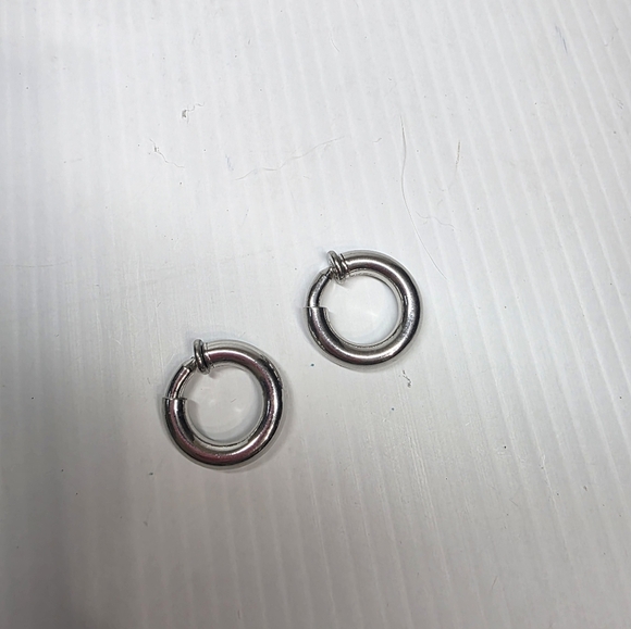 Silver toned puffy hoop huggie clip on retractable comfort Earrings - Picture 8 of 11